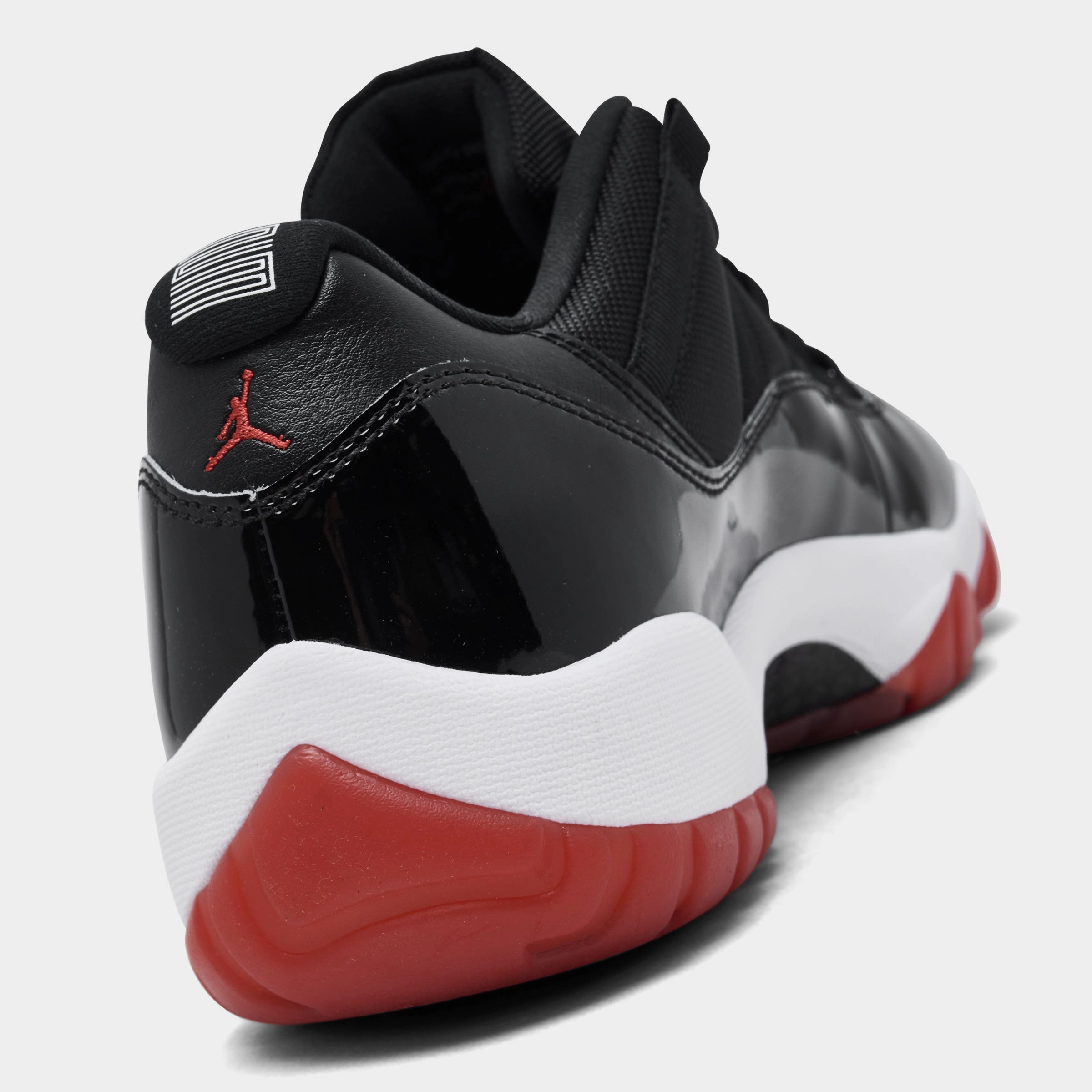 Jordan 11 Retro Low Black / Varsity Red - White