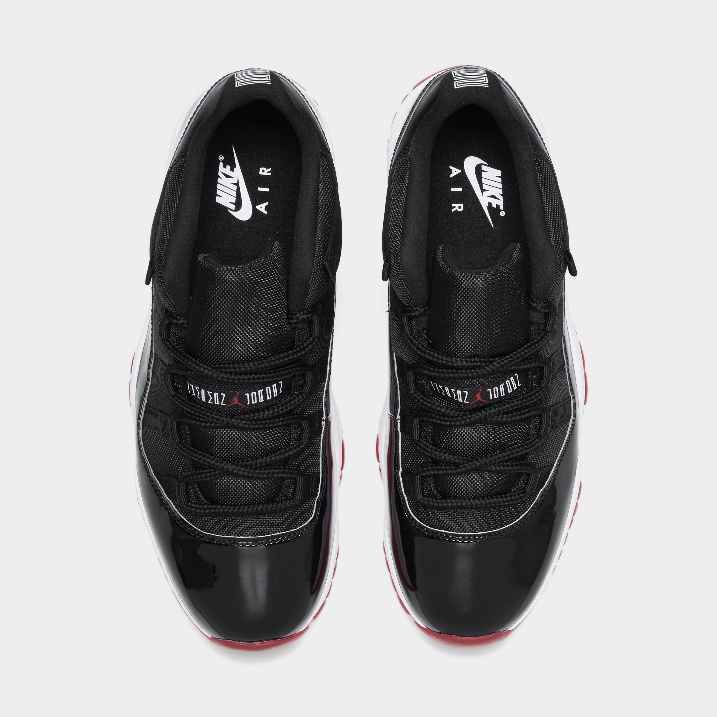 Jordan 11 Retro Low Black / Varsity Red - White