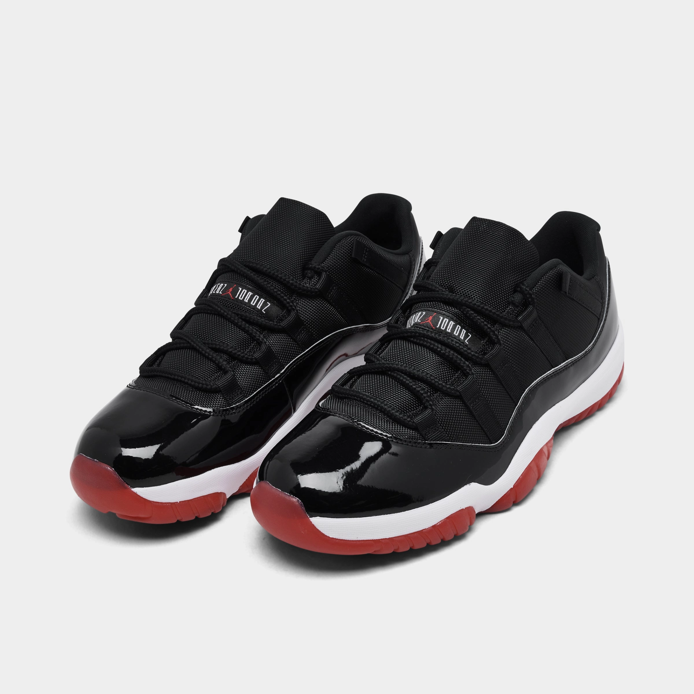 Jordan 11 Retro Low Black / Varsity Red - White