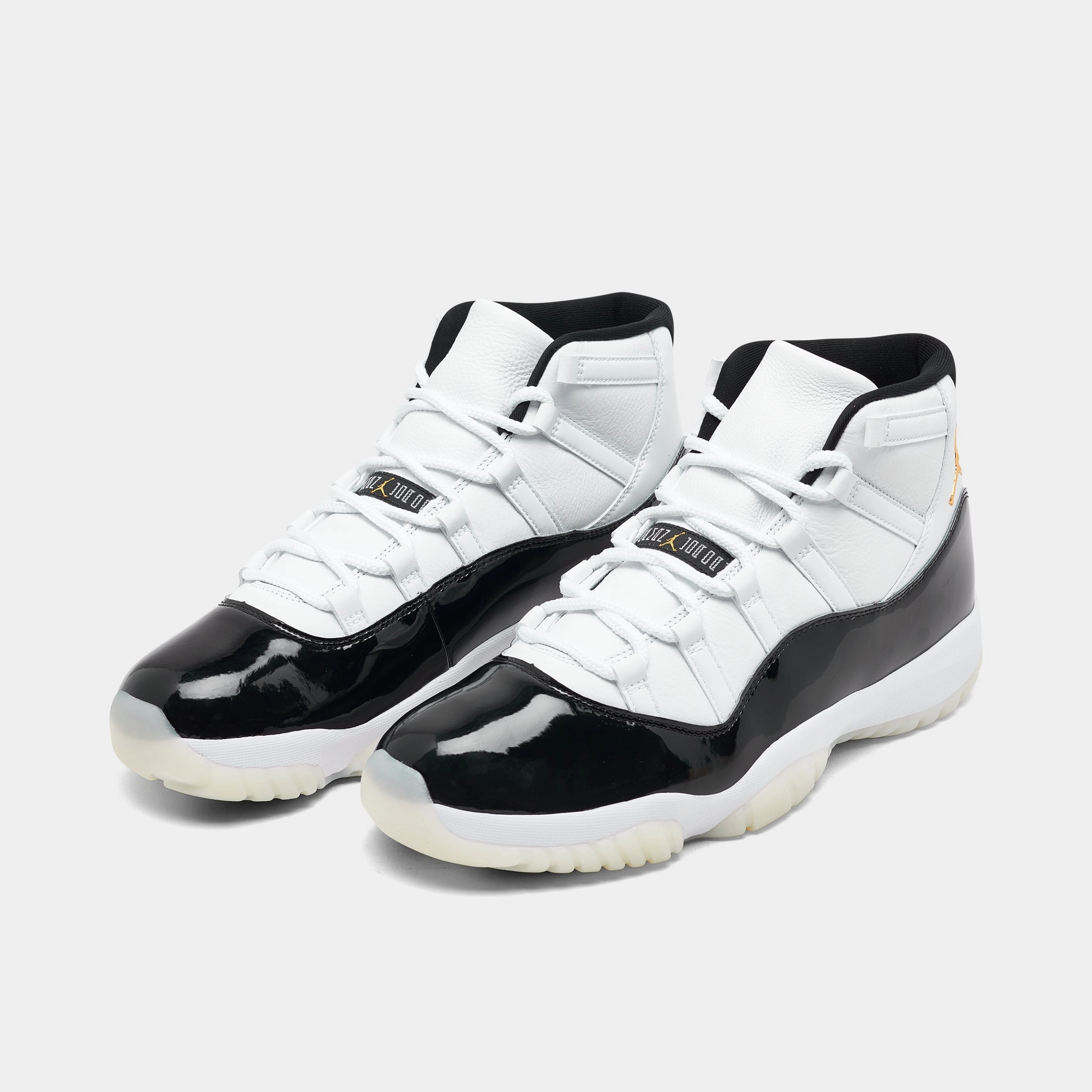 Jordan 11 Retro White / Metallic Gold - Black